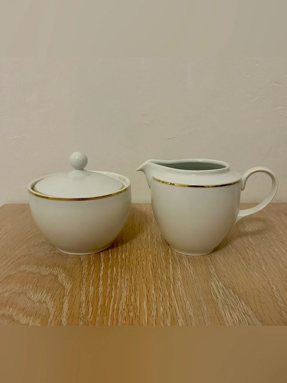 Elegant White Porcelain Sugar and Creamer Set with Gold Accent
